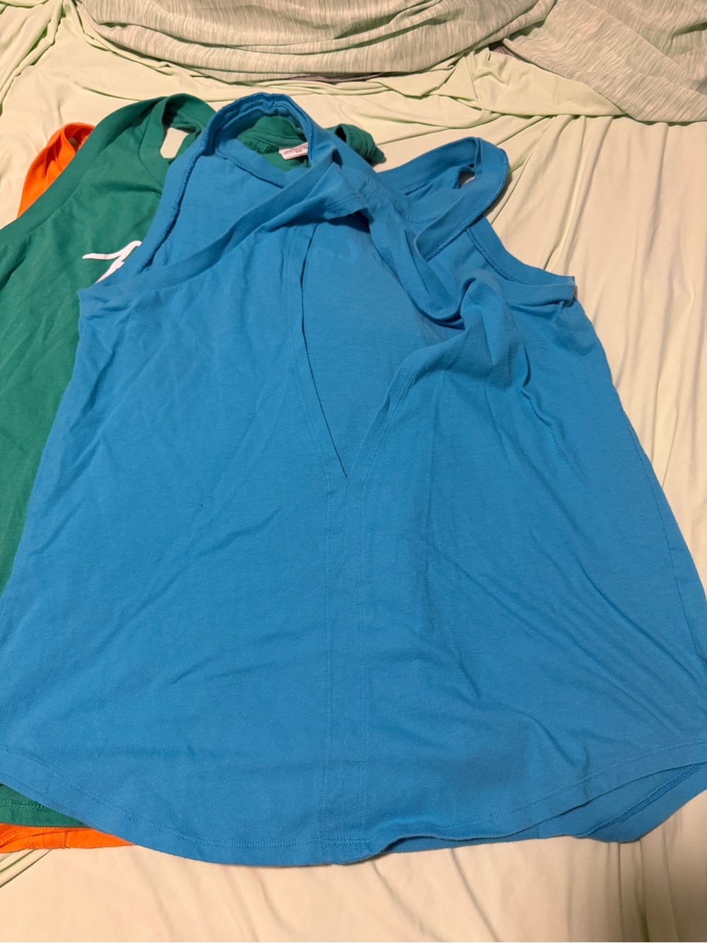 3) VS Pink tank tops with diamond slice in back.